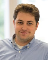 James Macpherson in a blue button down shirt
