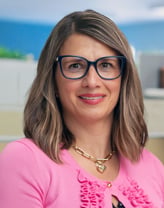 Nadia Boller smiles at the camera.