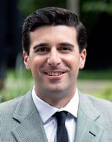 Nick Rutigliano in a checkered blazer and white shirt.