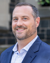  Shaun Lewis smiles at the camera.