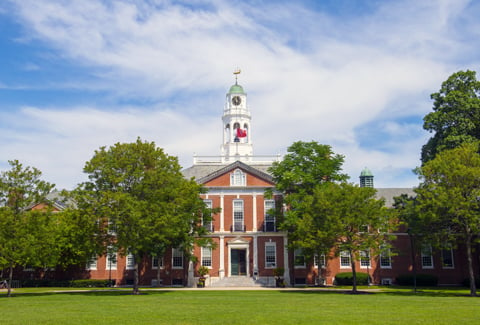 Exterior of large, historic brick building on the Phillips Exeter Academy campus.