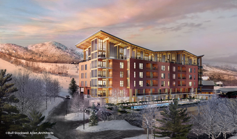 Snowy view of One Spruce Peak residences and penthouses.
