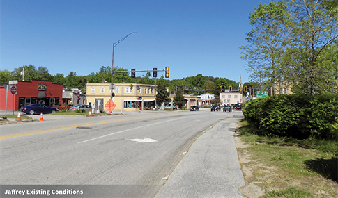 Route 202 intersection with stoplights and buildings prior to improvements.