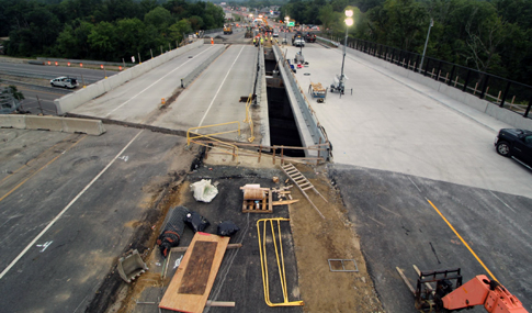 Aerial image of lateral slide bridge construction technique being utilized on roadway bridge.