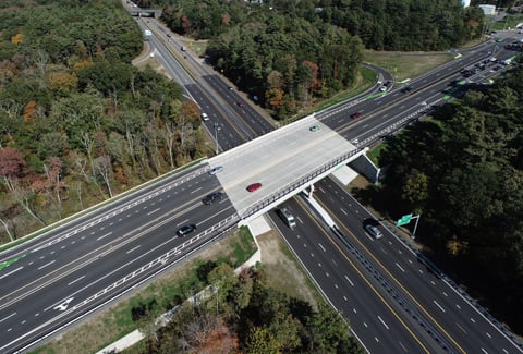 Aerial image of newly constructed bridge carrying Route 44 over Route 24 in Raynham, MA
