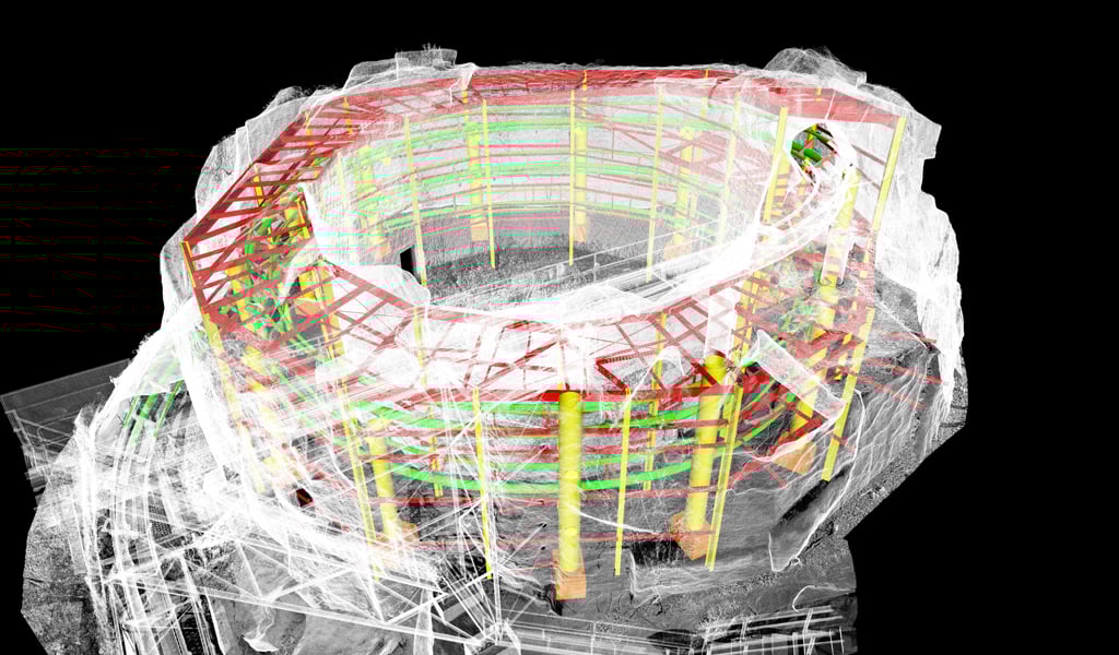 3D model of circular roller coaster structure wrapped in white point‑cloud data.