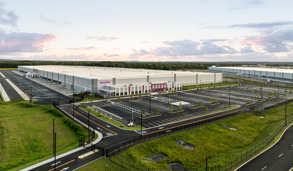 A Wayfair logistics center seen from a distance.
