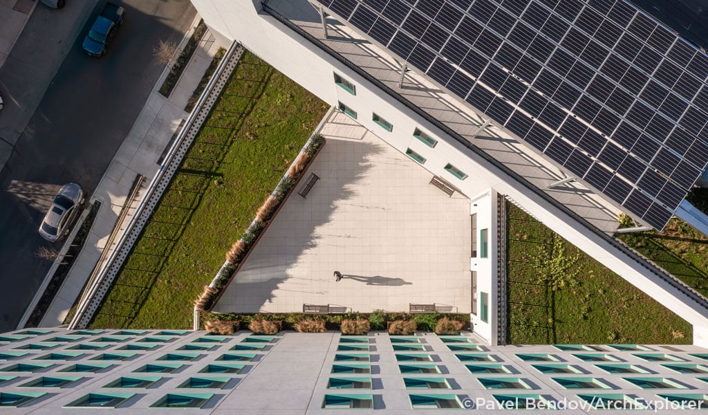 Rooftop of Beach Green Dunes III fully covered with solar panels.