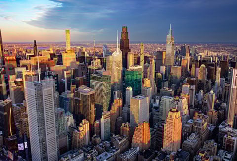 Aerial view of the New York City Midtown East skyline at sunset. 