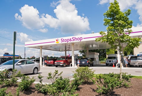 Stop & Shop fueling station with seven cars and vans at the pumping stations