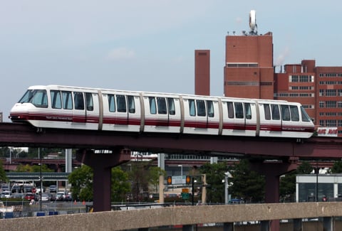 Newark International Airport AirTrain transporting passengers across the airport complex.