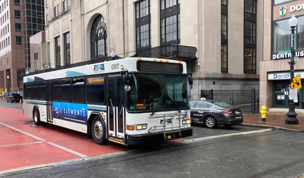 RIPTA bus at a downtown intersection