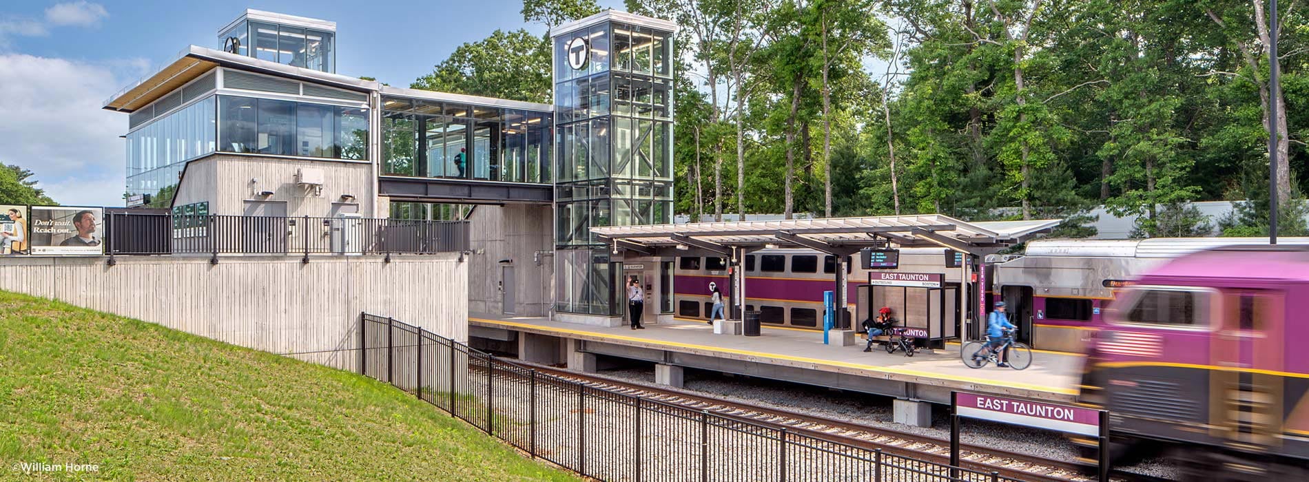 East Taunton station pedestrian bridge, station, and loading platform.