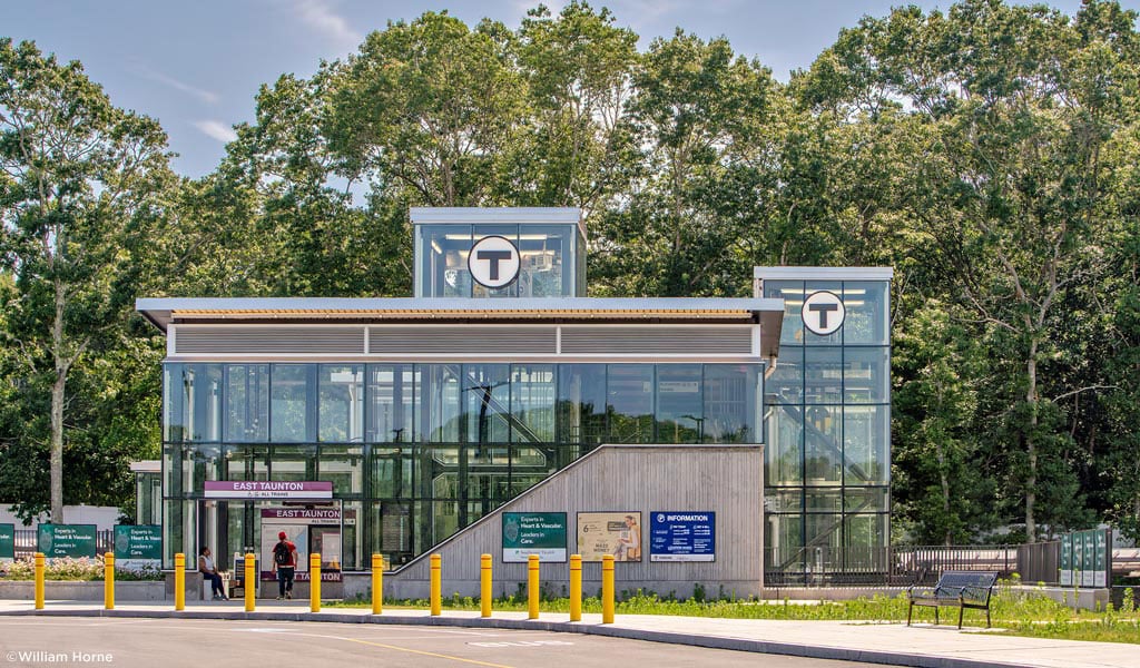 East Taunton station, a two-story glass structure.