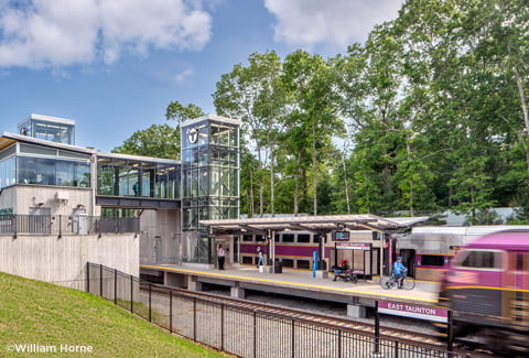 East Taunton station pedestrian bridge, station, and loading platform.