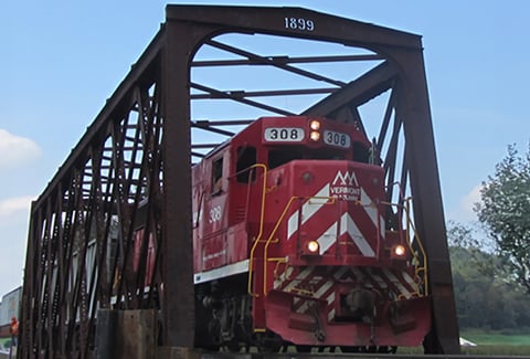 Vermont Rail System locomotive 308 crossing restored 1899 railroad bridge, rebuilt after Hurricane Irene damage.