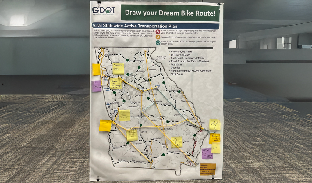 Map of Georgia with bike routes and sticky notes from a public meeting.