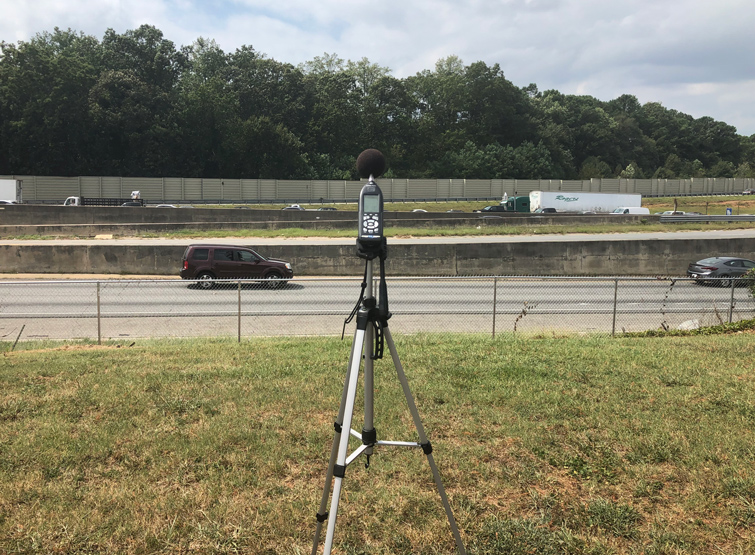 Noise monitoring on a busy interstate with cars and trucks.