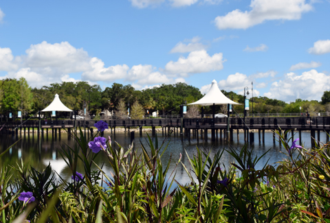 A canopied bridge over water.