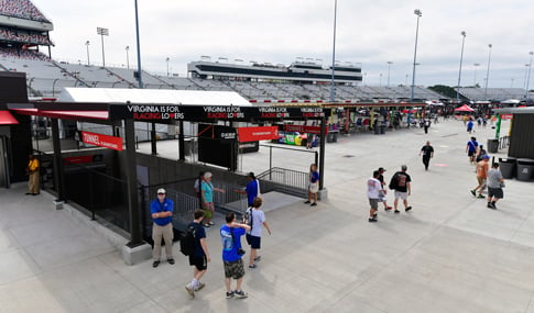 Fans enter and exit the Fan Zone using the Pedestrian Tunnel Entrance that connects to the grandstands.