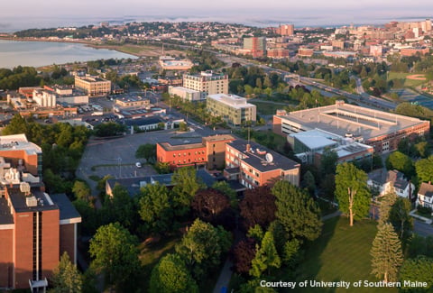 Aerial photo of University of Southern Maine at dusk 