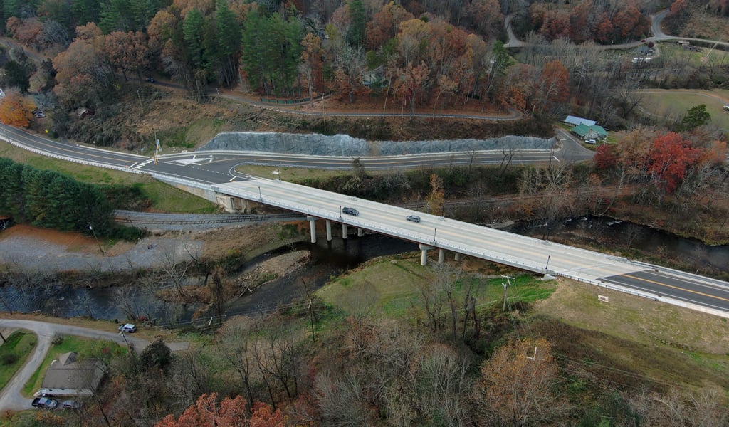 Aerial view of the side of the Dillsboro Bridge replacement, including the retaining wall.
