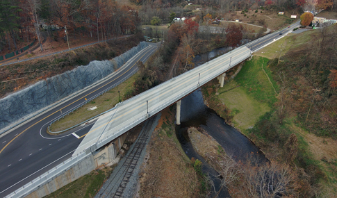 Aerial view of the Dillsboro Bridge replacement over the railroad and Scott Creek. 