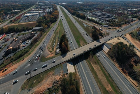 Construction of the existing diverging interchange over I-77. 