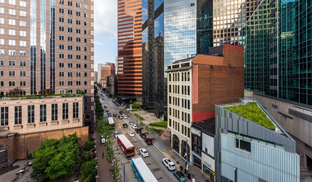 Aerial view of Pittsburgh inner city streets and buildings.