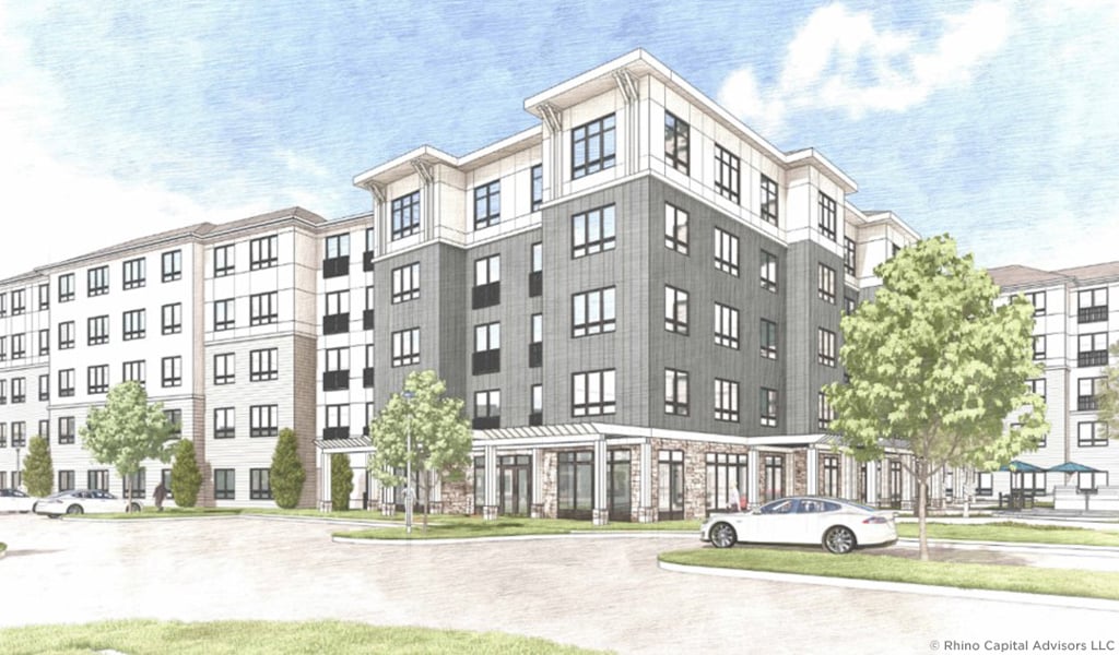 Rendering of a multi-story apartment building with trees and parked cars in front.