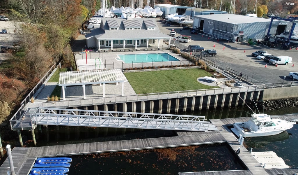 The reimagined marina features a pool house, pool, splash pad, open lawn, grilling spaces, and improved waterfront access.