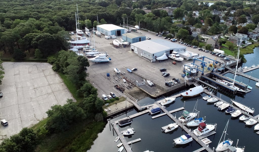 Before enhancements were made, a large surface parking lot and narrow dock existed.