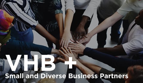 Diversity teamwork with joined hands