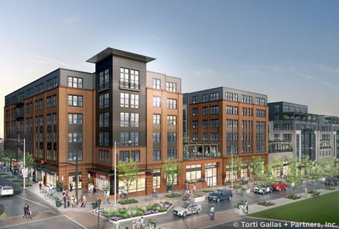 Rendering of a modern multi-story building with a brick facade, large windows, urban streetscape with pedestrians and cars.