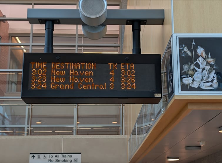 A digital passenger information display sign.