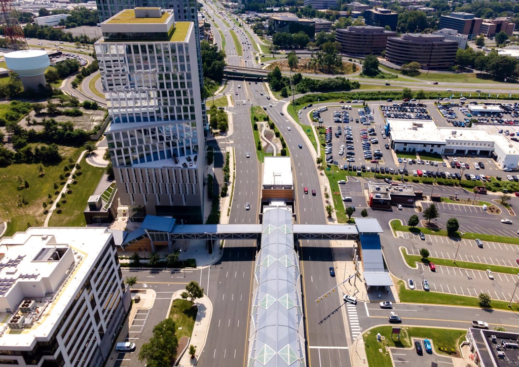 Washington Metro station and city traffic in the Washington suburb of D.C. City of Tysons, Virginia.