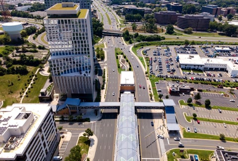 Washington Metro station and city traffic in the Washington suburb of D.C. City of Tysons, Virginia.