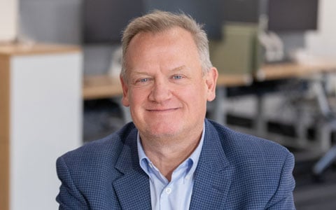 Andy Gillespie smiling at the camera.