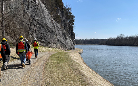 The project team takes a final walk through along the towpath.