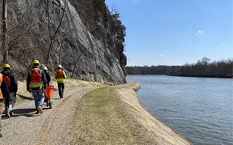 The project team takes a final walk through along the towpath. 