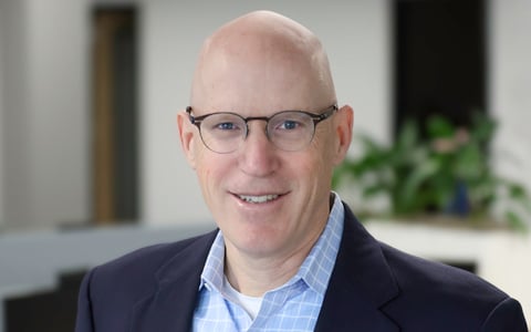 Greg Bosworth smiling at the camera.