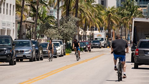 Image showing people riding bicycles and a city street