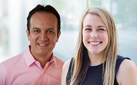 Jaime and Cameron smiling at the camera.