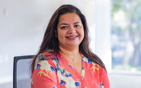 Arpita Guha in an office setting.