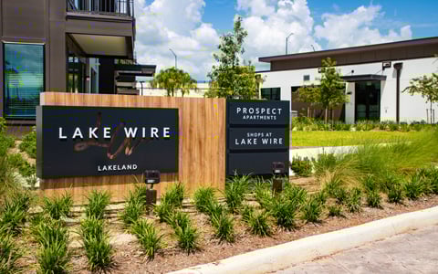 Signs in front of the Prospect Apartments in Lake Wire.