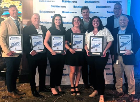 VHB team members accept awards at the LIBN Awards ceremony.