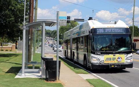 A MARTA bus at a bus stop in Clayton County.