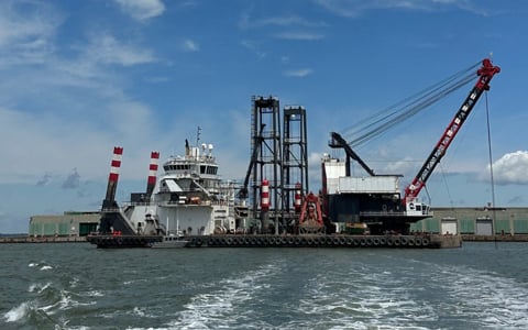 The crane and specialized dredging equipment to help deepen and clear channels. 
