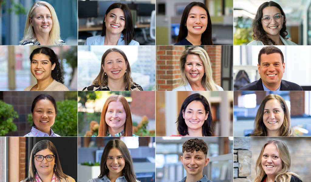 Sixteen VHB employees smiling at the camera.