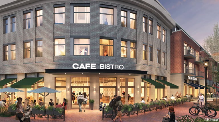 A rendering of the Café Bistro exterior with tables, planters, and pedestrians on brick sidewalks at 21 River Road. 